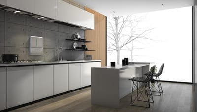 Modern minimalist kitchen with white cabinets, a long island with two black chairs, open shelves displaying dishes, and a large floor-to-ceiling window showing a leafless tree outside.